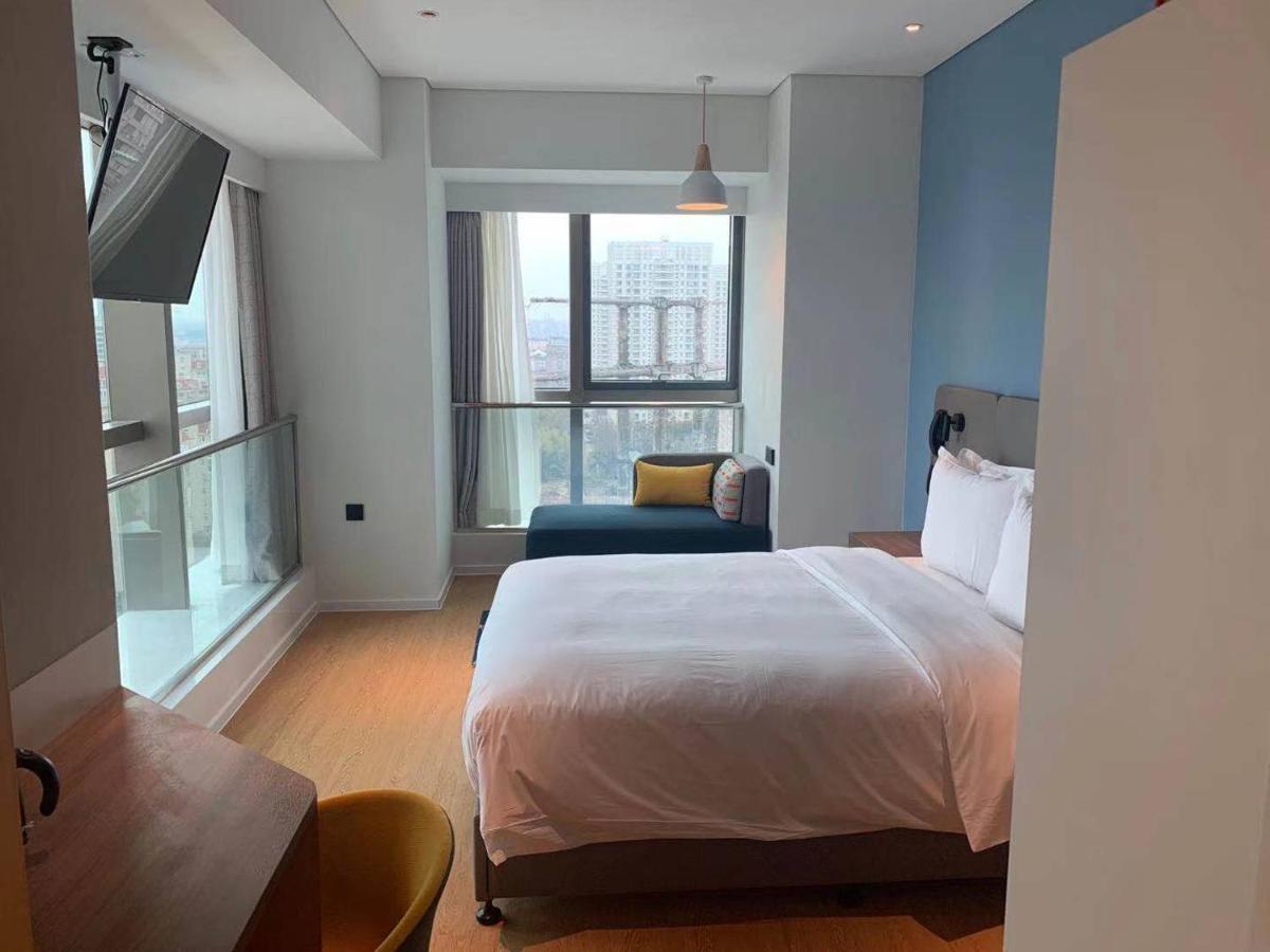 Holiday Inn Express Shanghai Baoyang By Ihg Экстерьер фото