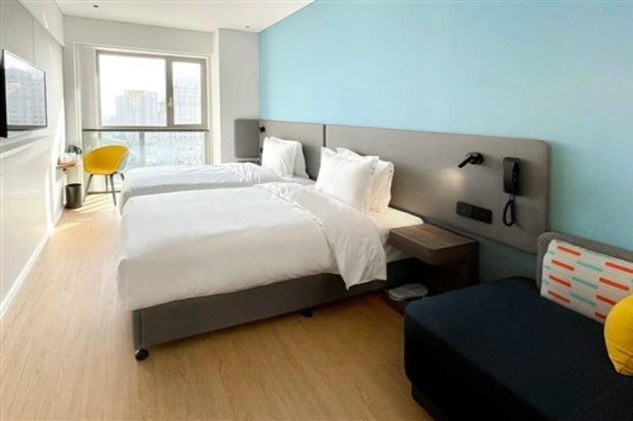Holiday Inn Express Shanghai Baoyang By Ihg Экстерьер фото